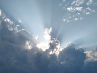 Sun behind clouds