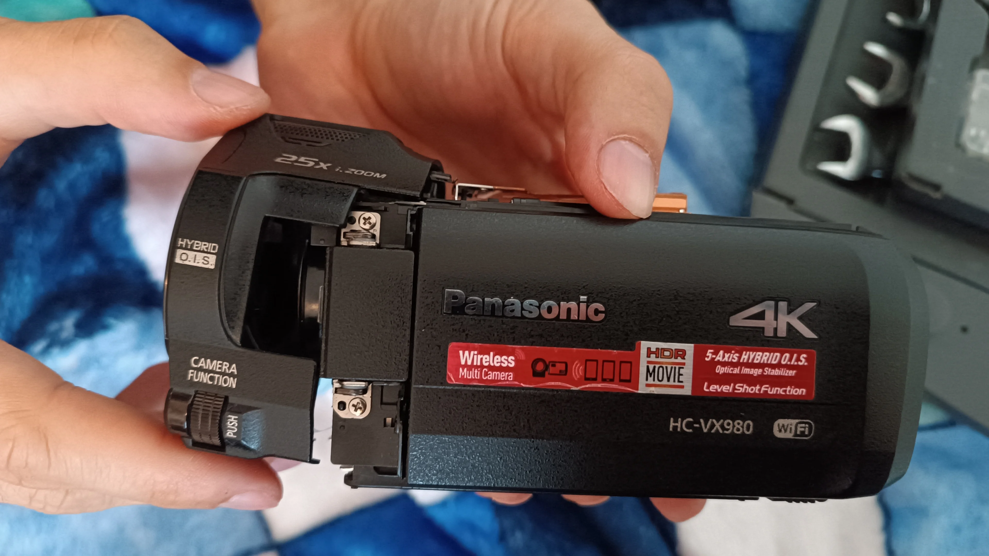 The top part and also the part around the lens needs to be removed.