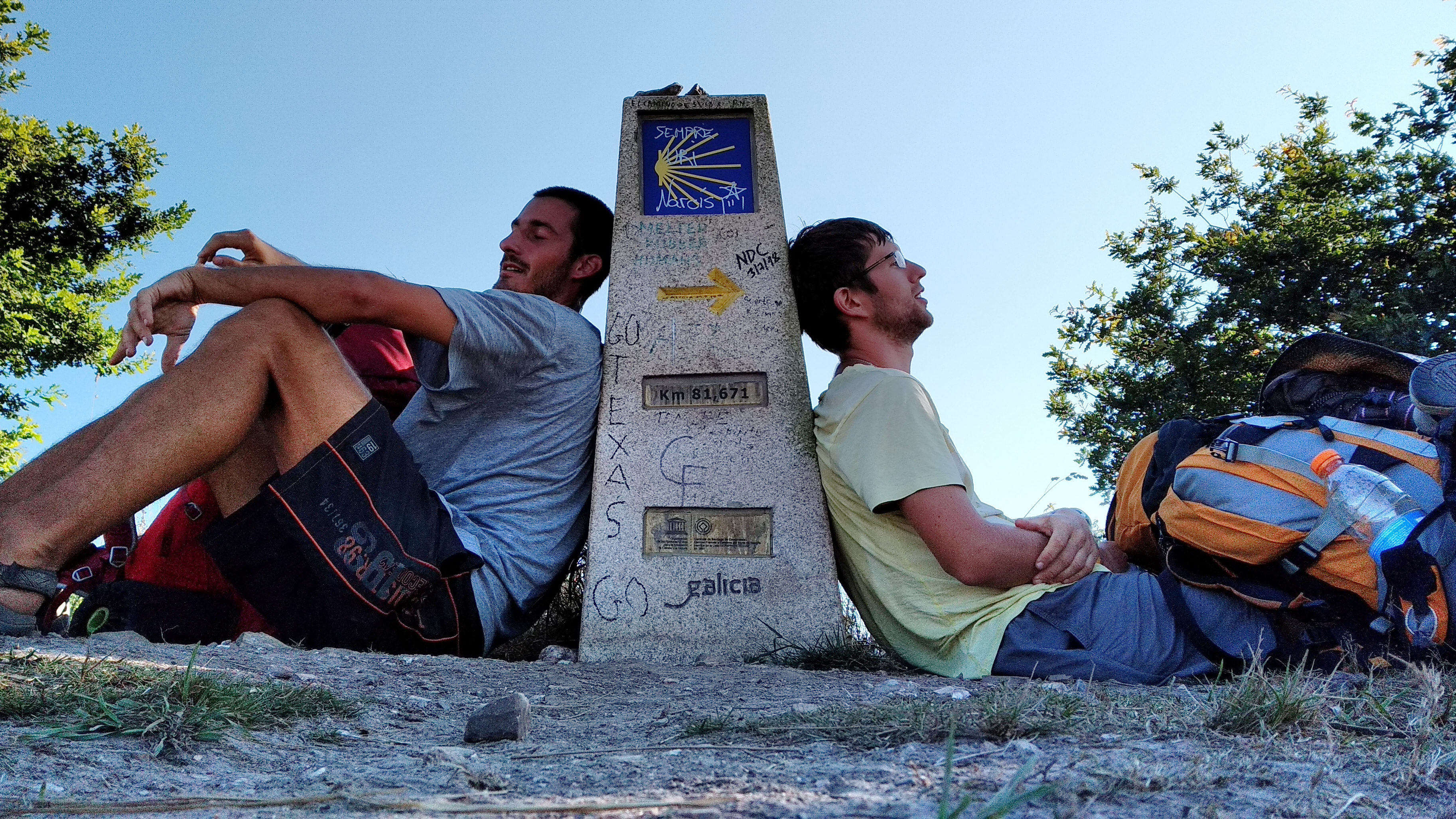 Tired pilgrims resting on the way to Santiago