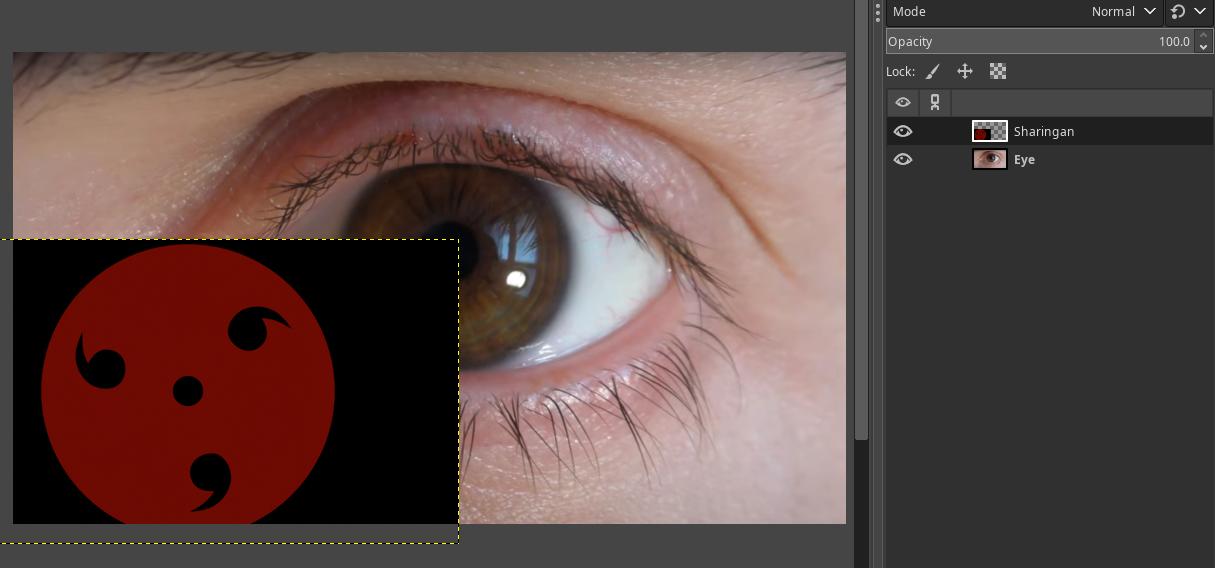 I simply dropped two images into GIMP. The eye image and sharingan image.