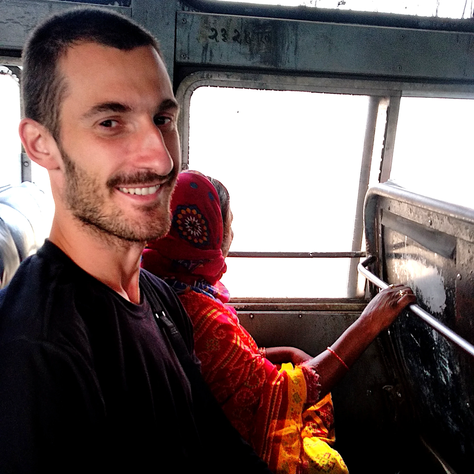 Traveling by a public bus in India is a very authentic experience.